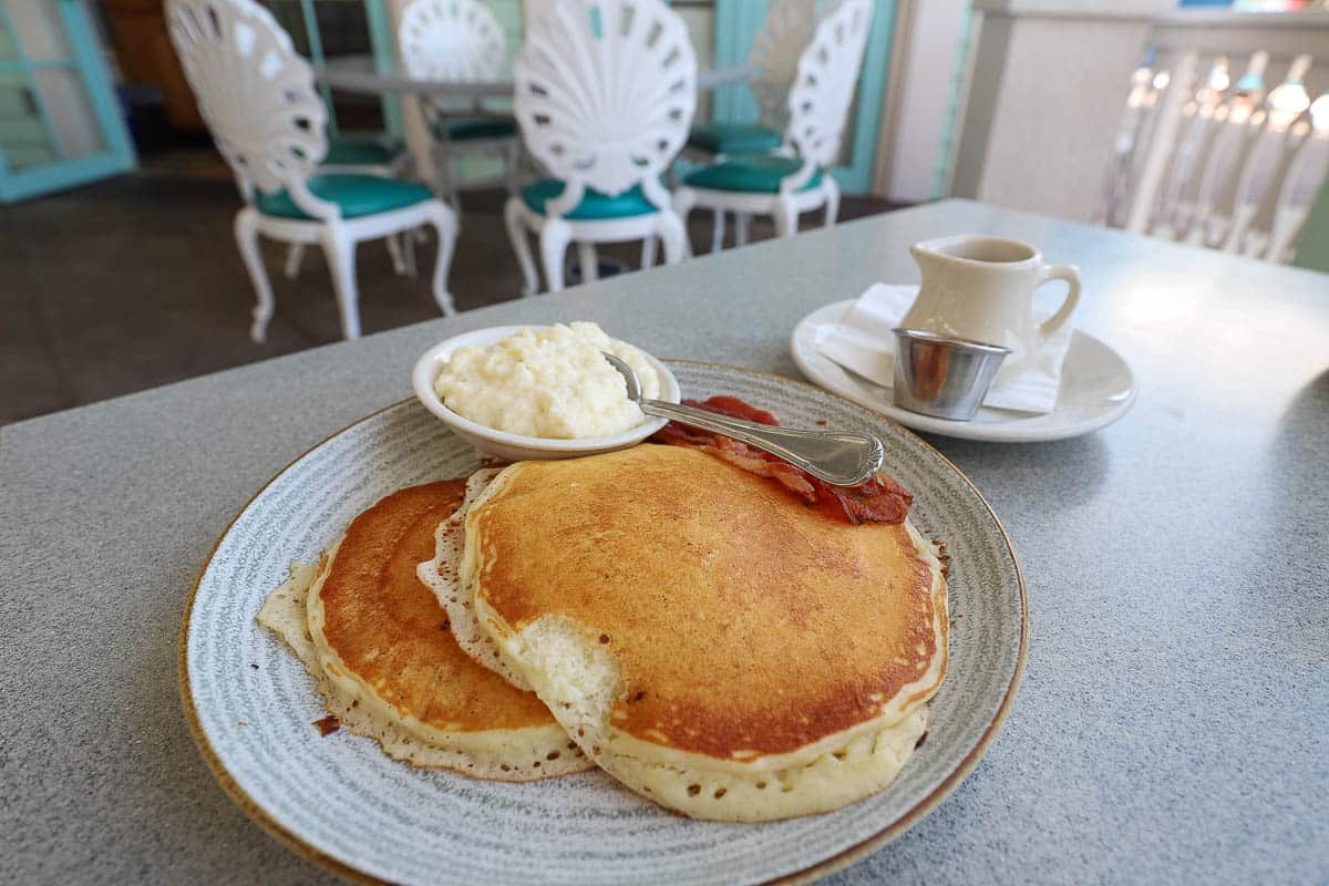 an order of buttermilk pancakes and grits 