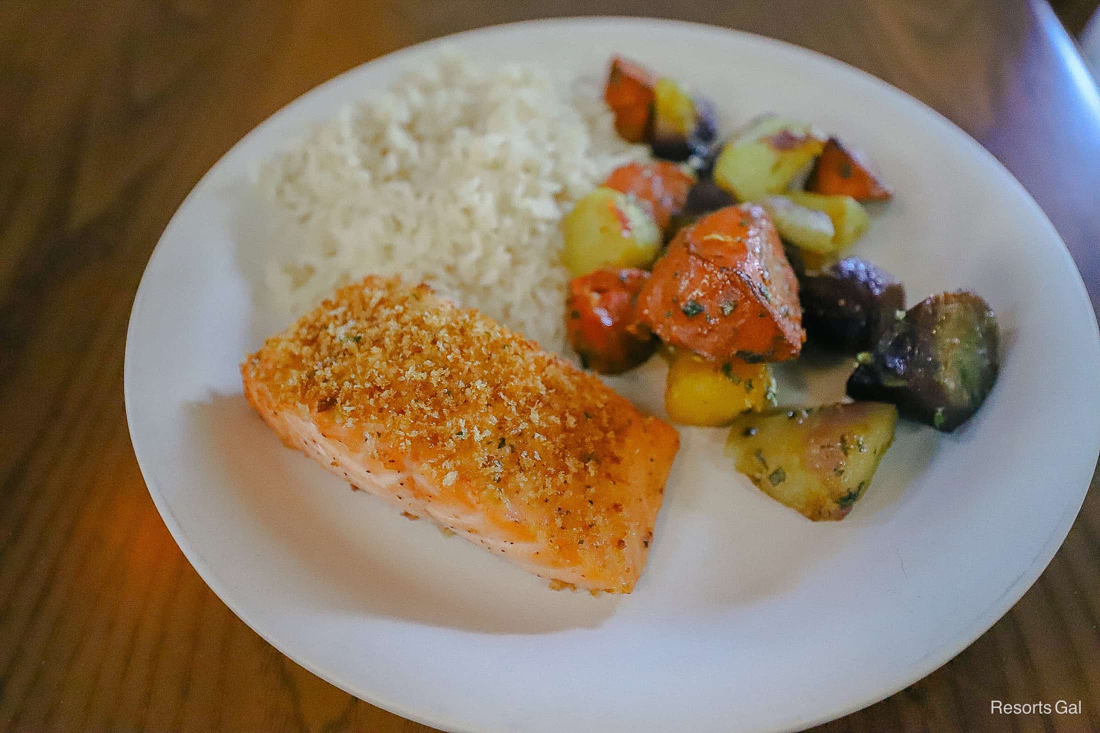 a dish of salmon, rice and rainbow carrots from the Create Your Own Menu section 
