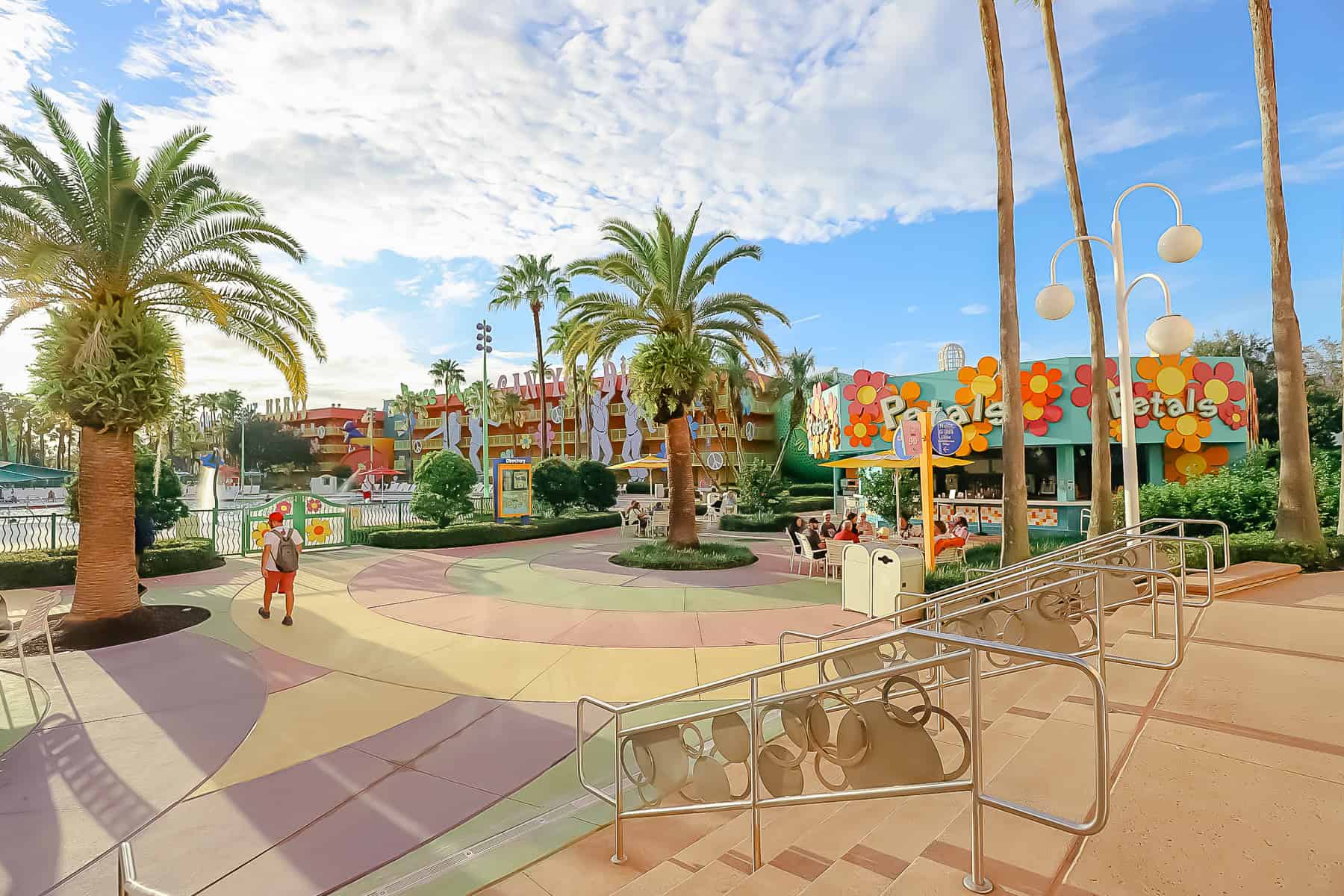 a view from the resort's lobby and food court that shows the pool bar is only a few steps away 