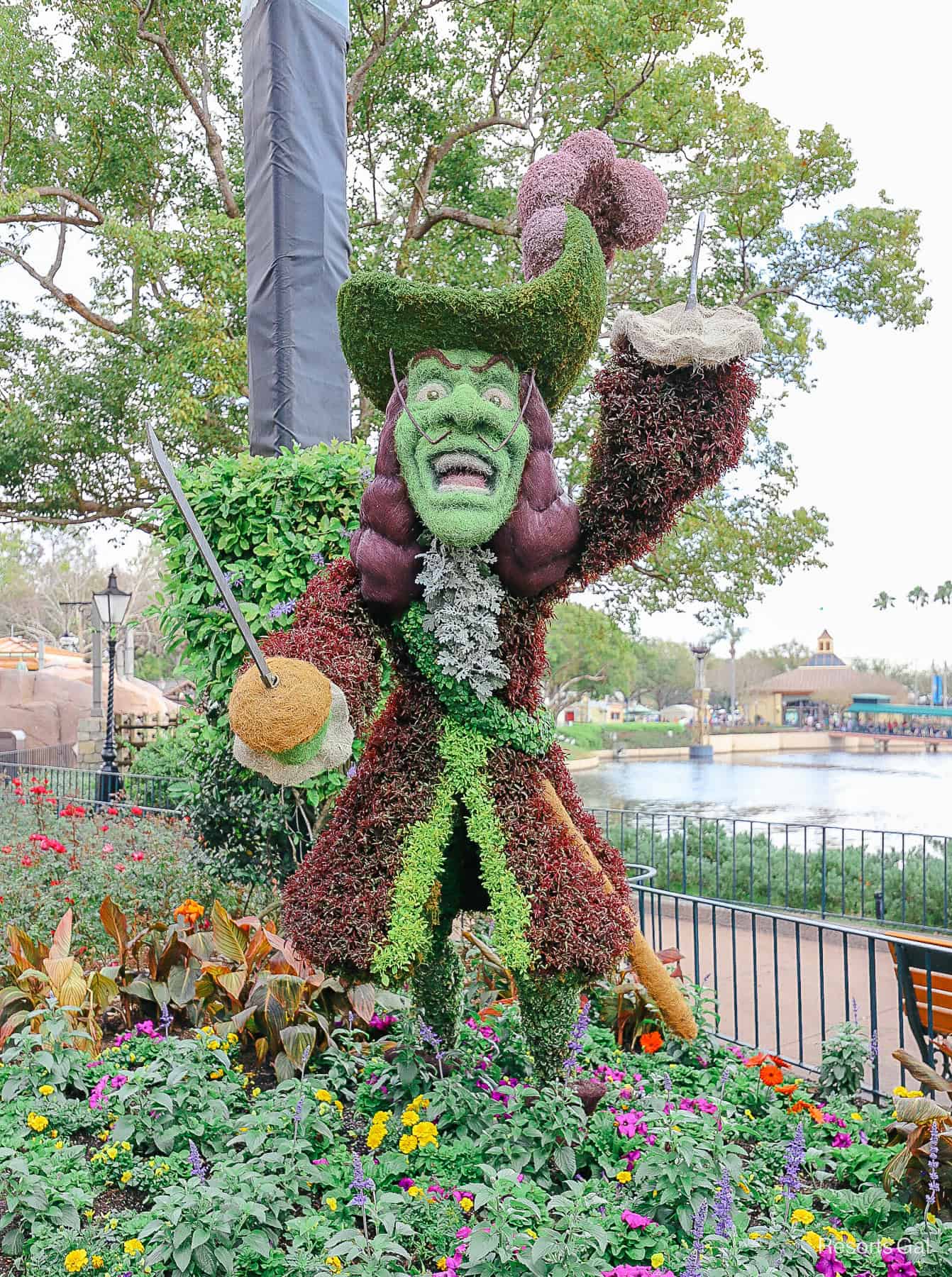 Captain Hook topiary cameo shows off his purple flume and red coat. 