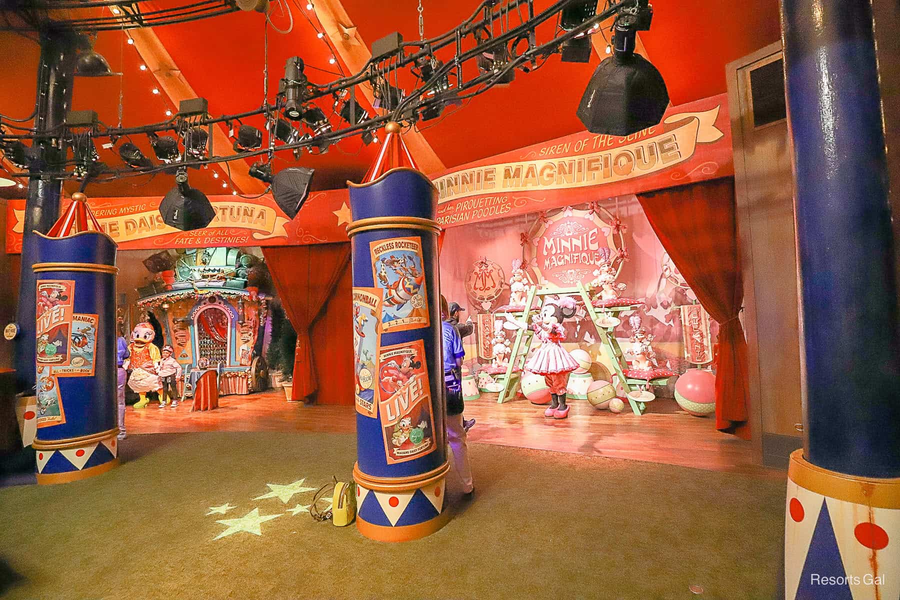 an overall view of the character setup on one side of the circus tent 