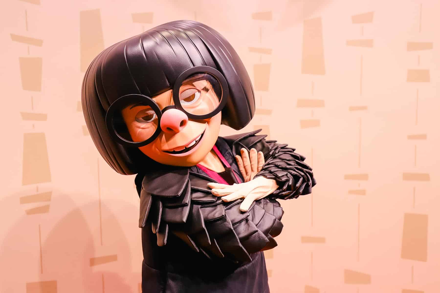 Edna mode poses with arms crossed.