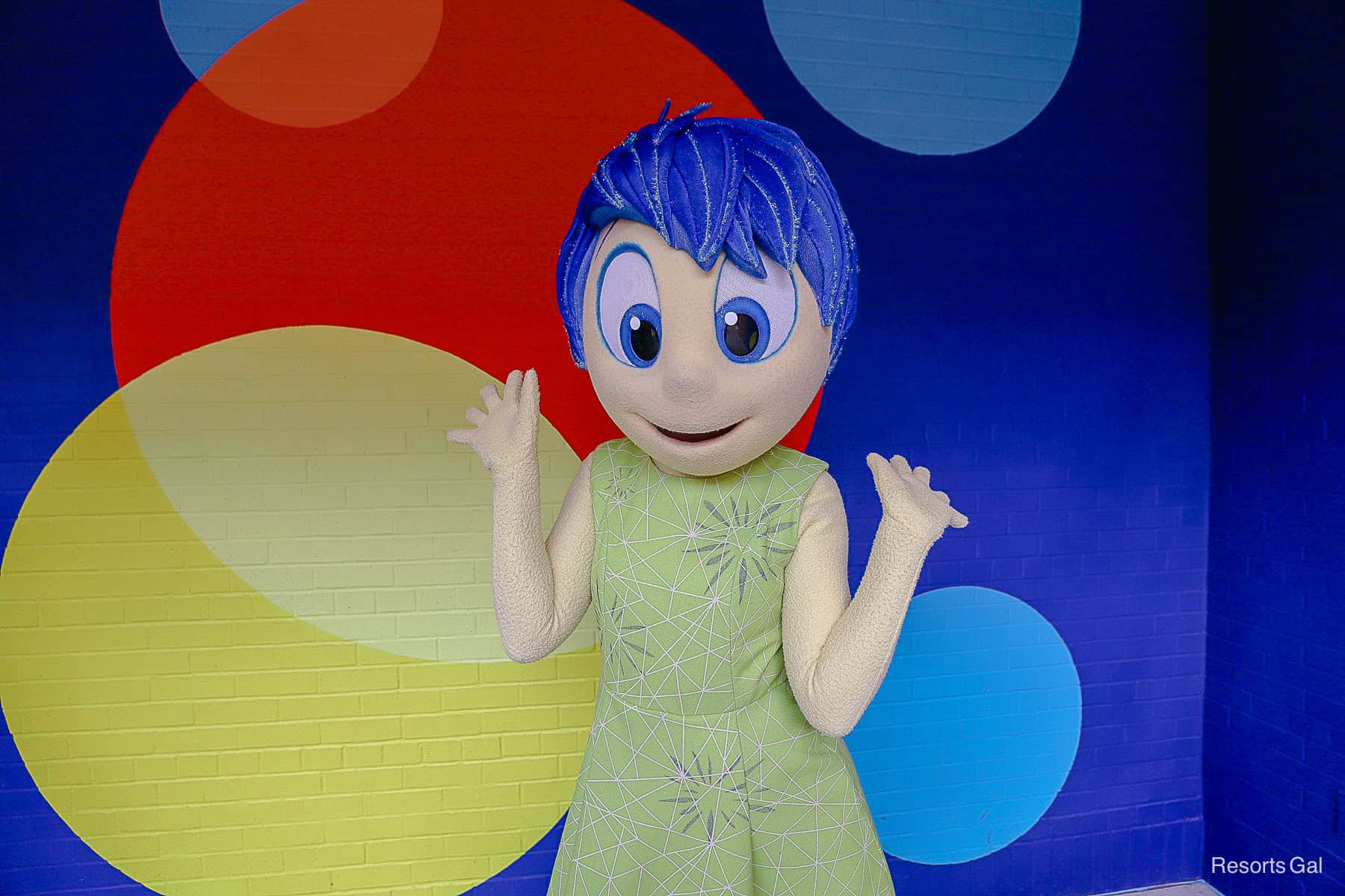 Joy from 'Inside Out' poses with arms up 