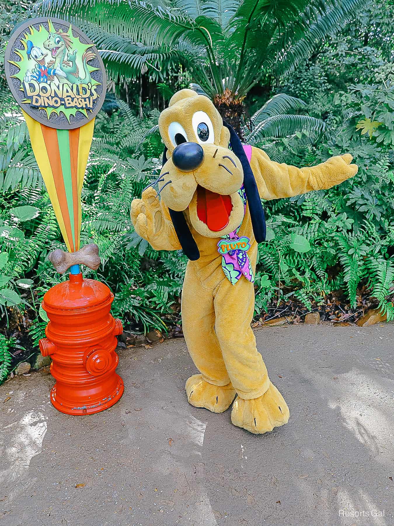 Pluto in pre-historic outfit at Donald's Dino Bash 