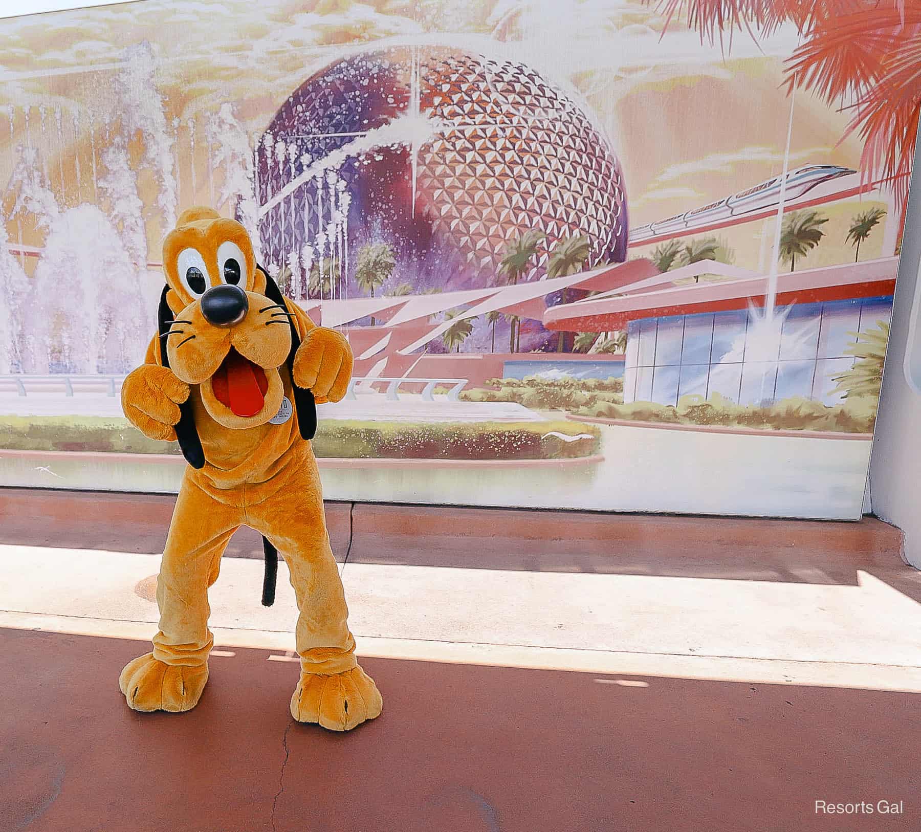 Pluto poses for a photo 