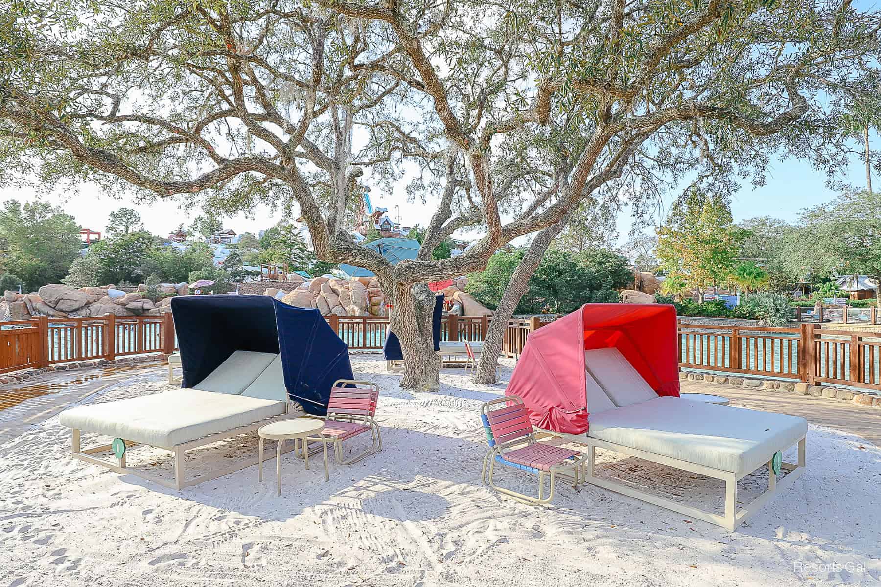 a navy blue and pink Lodge Umbrella rental at Blizzard Beach 