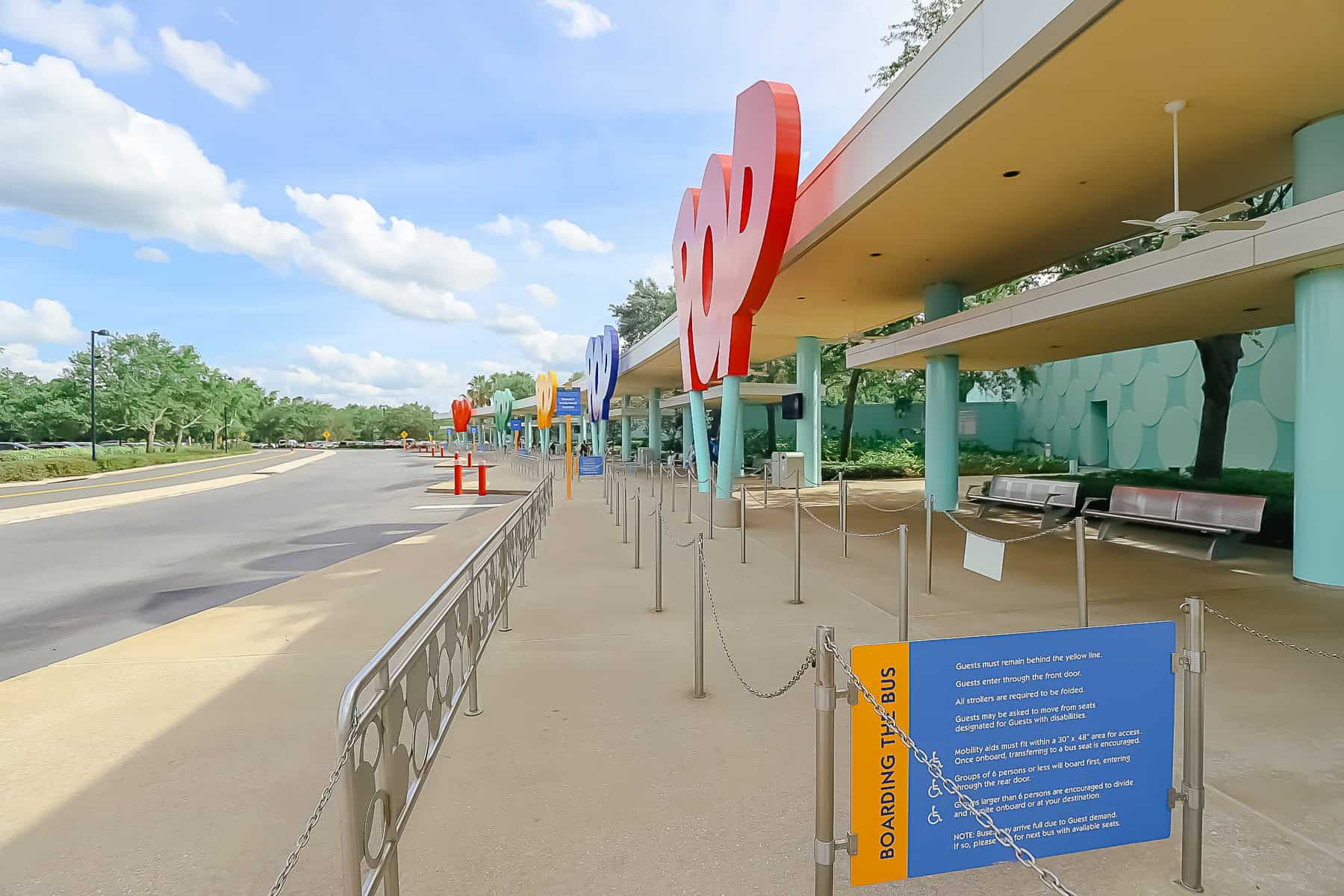 the resort bus stop at Disney's Pop Century Resort with wait queue