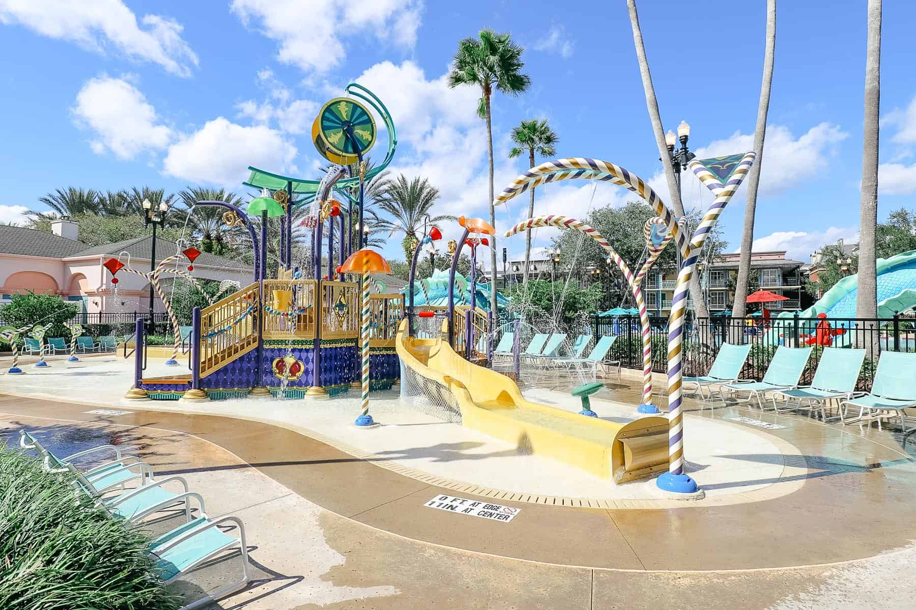 a vibrant aquatic play area with sprayers 