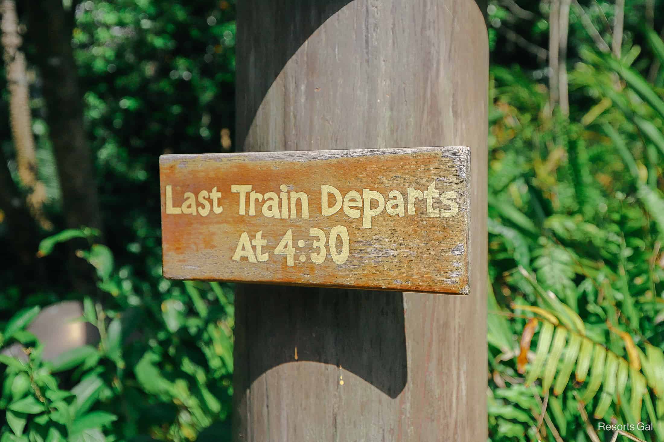 a sign that says the last train departs at 4:30 for Rafiki's Planet Watch 