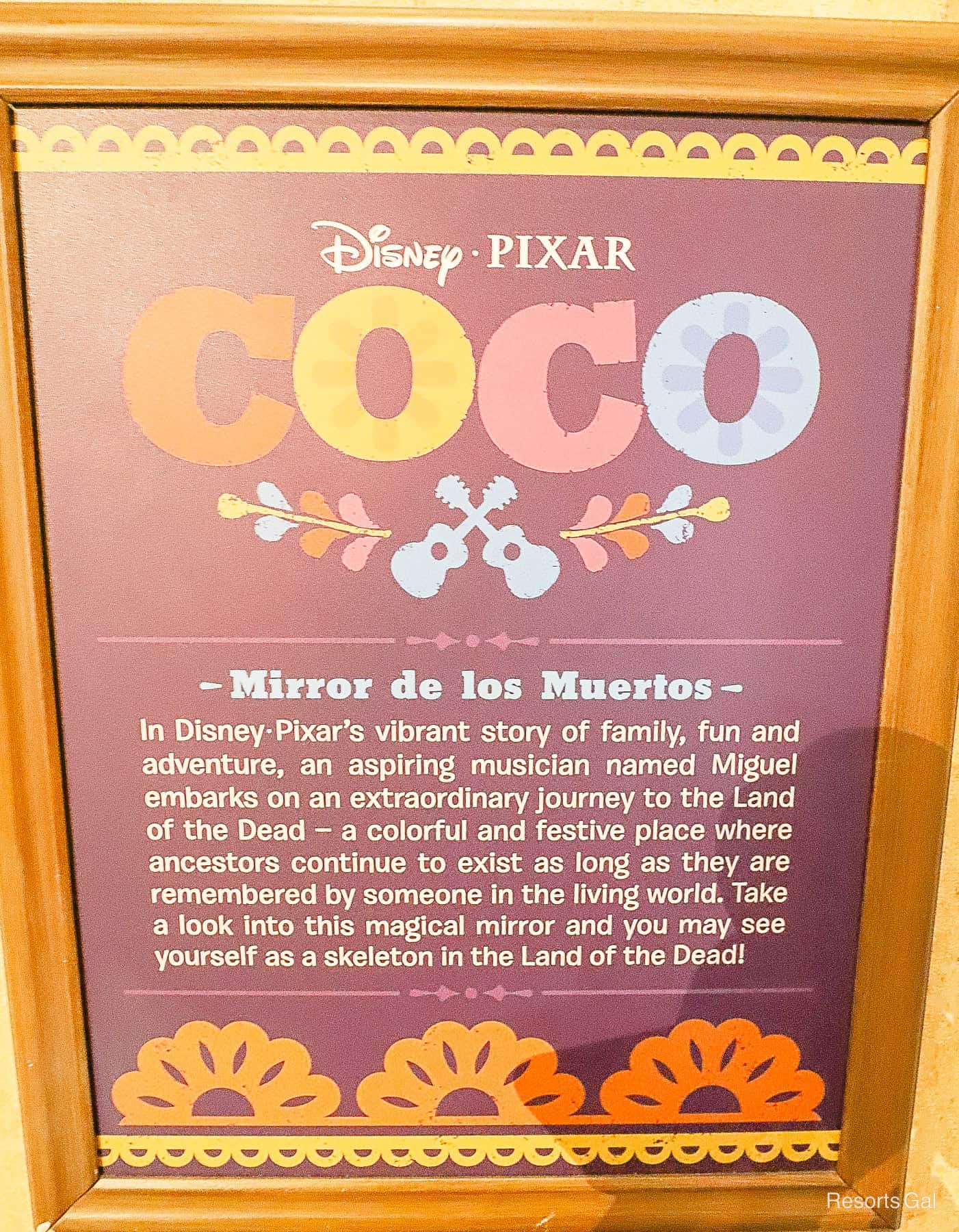 an informational sign that explains how the Mirror de los Muertos works at Epcot's Mexico Pavilion 