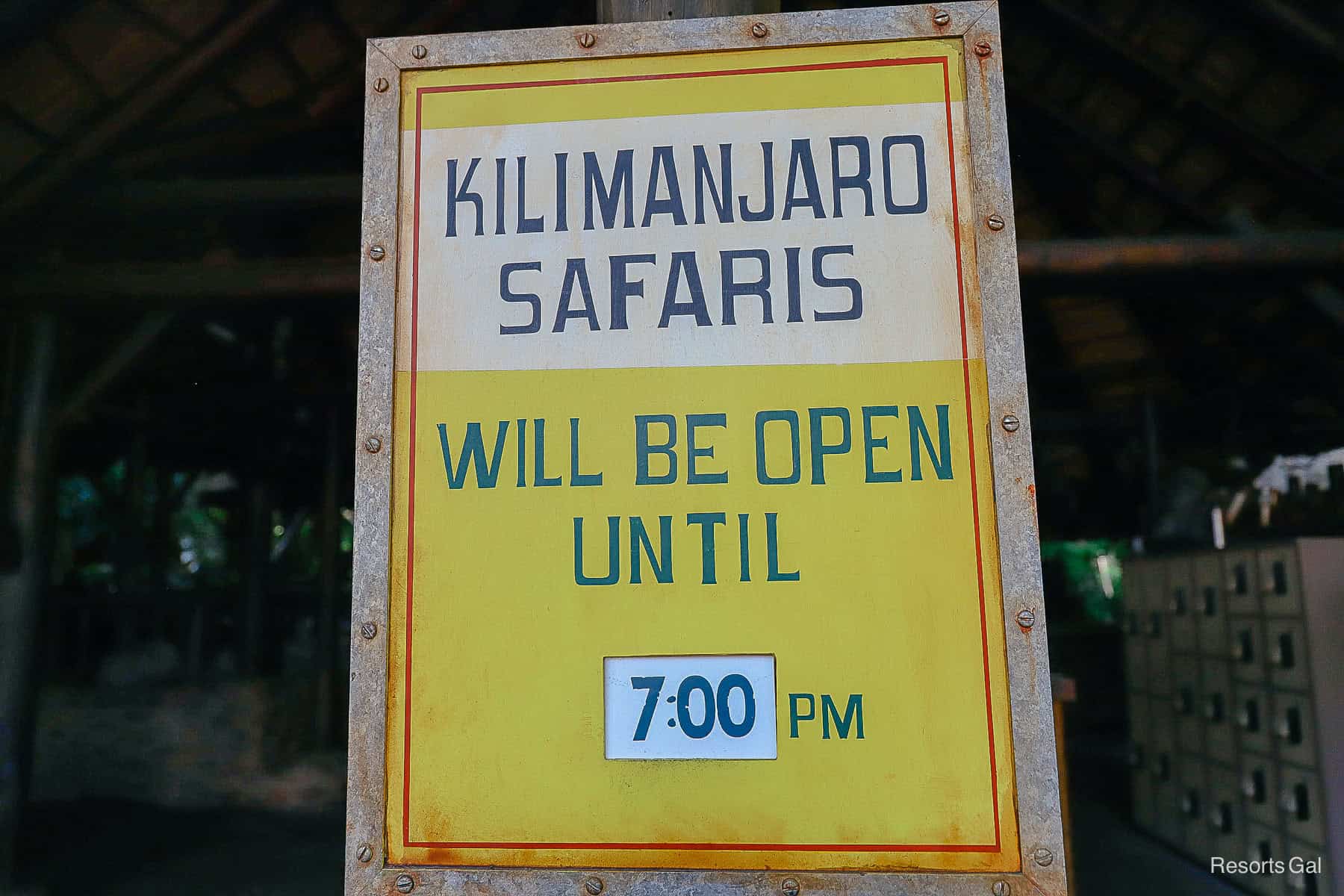 a sign that says how late Kilimanjaro Safaris will be open 