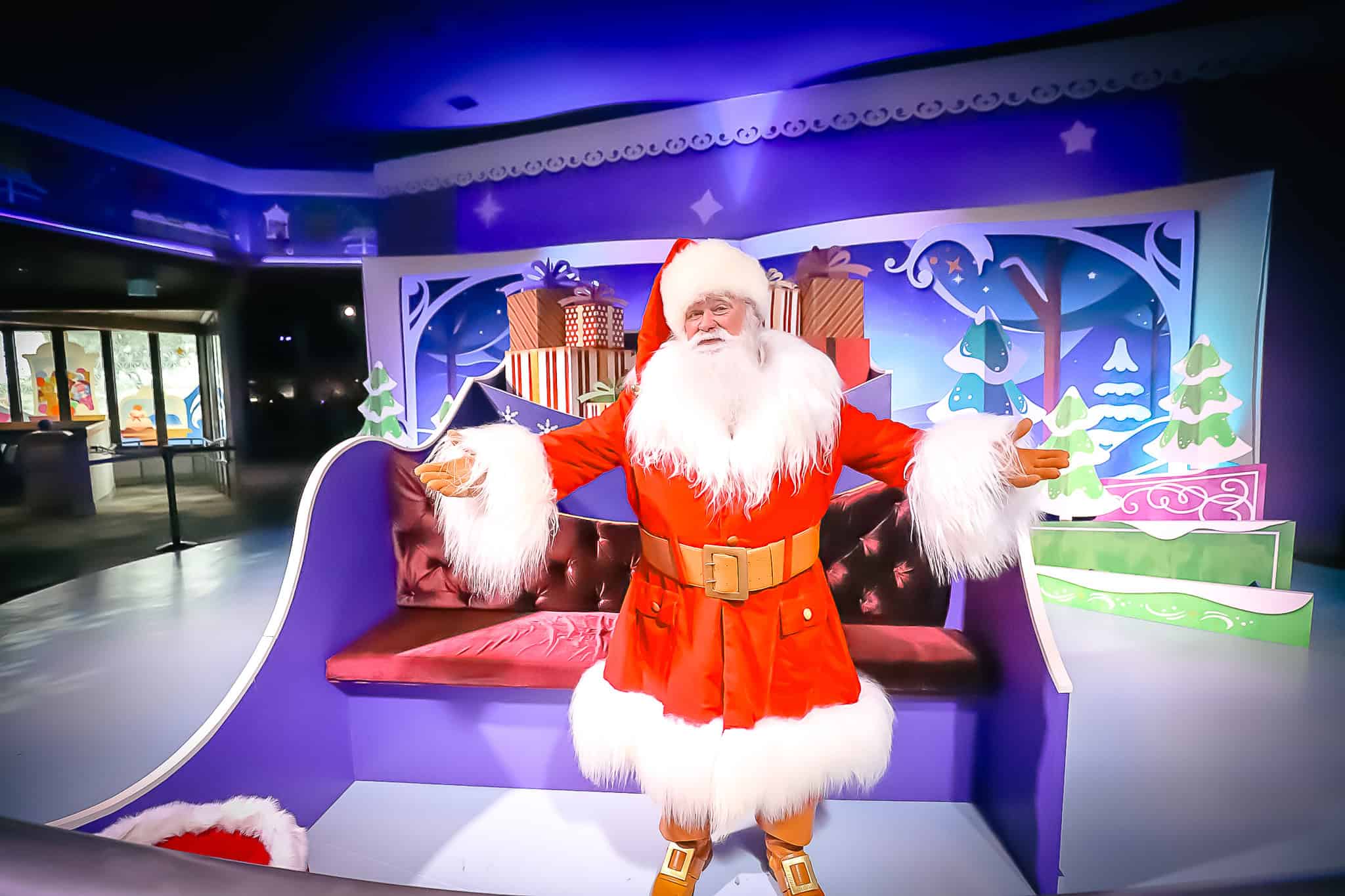 Santa Claus in a purple sleigh at Epcot 