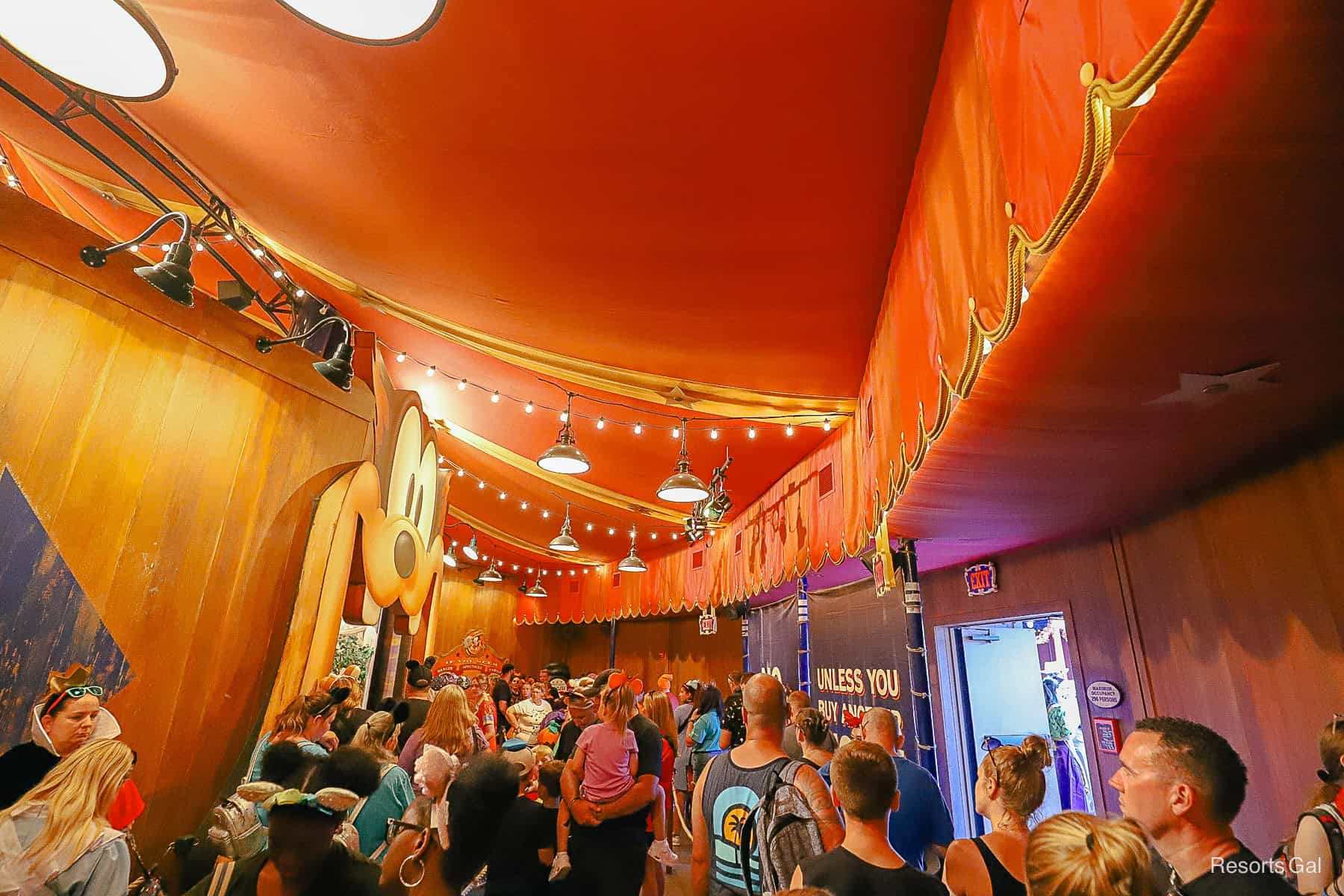 a crowd of guests waiting to meet the Seven Dwarfs 