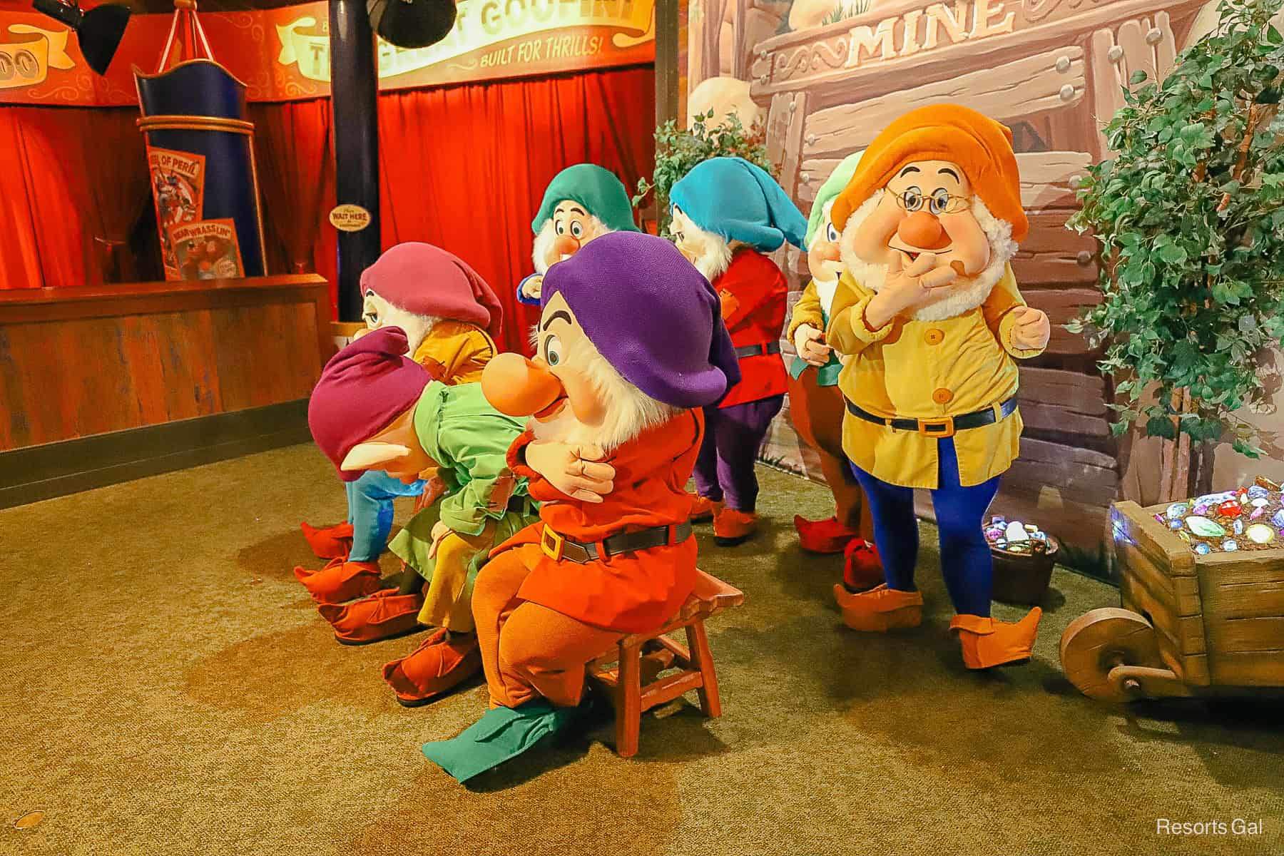 The Seven Dwarfs from a side angle while standing in line to meet them. 