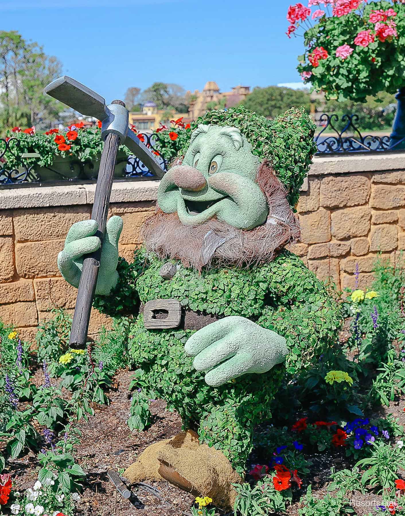 Happy is cheerful with big dimples and a wide grin in topiary form. 