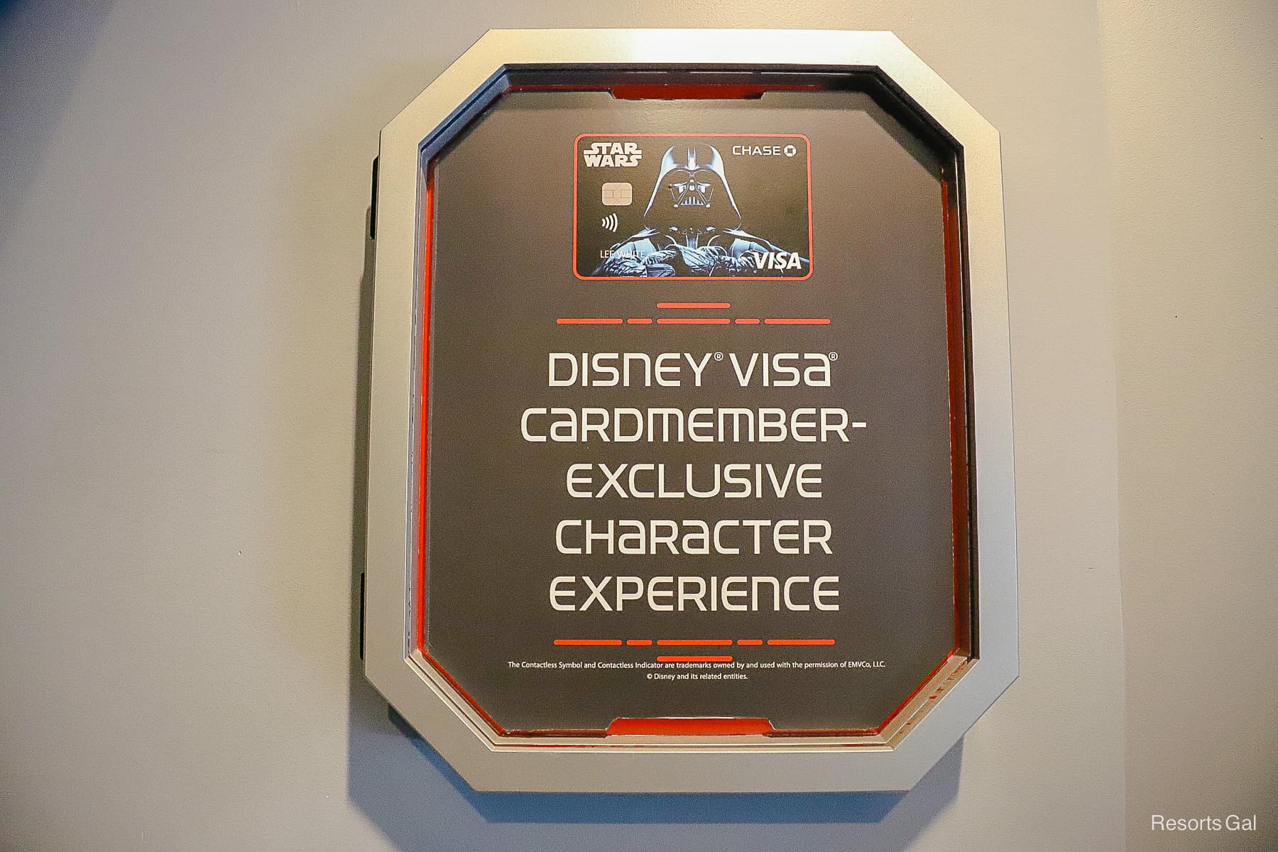 a sign indicating the entrance for the Disney Visa meet-and-greet