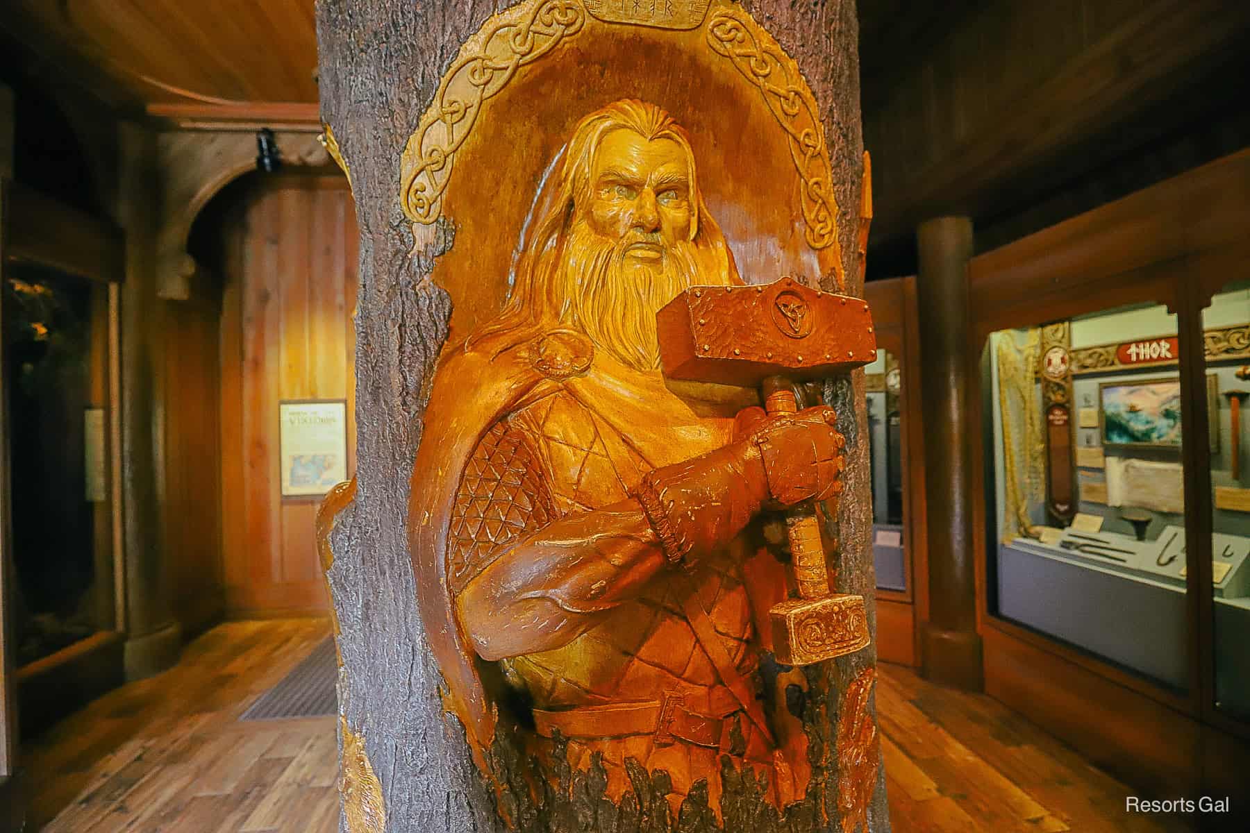 a wood carving of Thor in the Viking exhibit at Epcot 