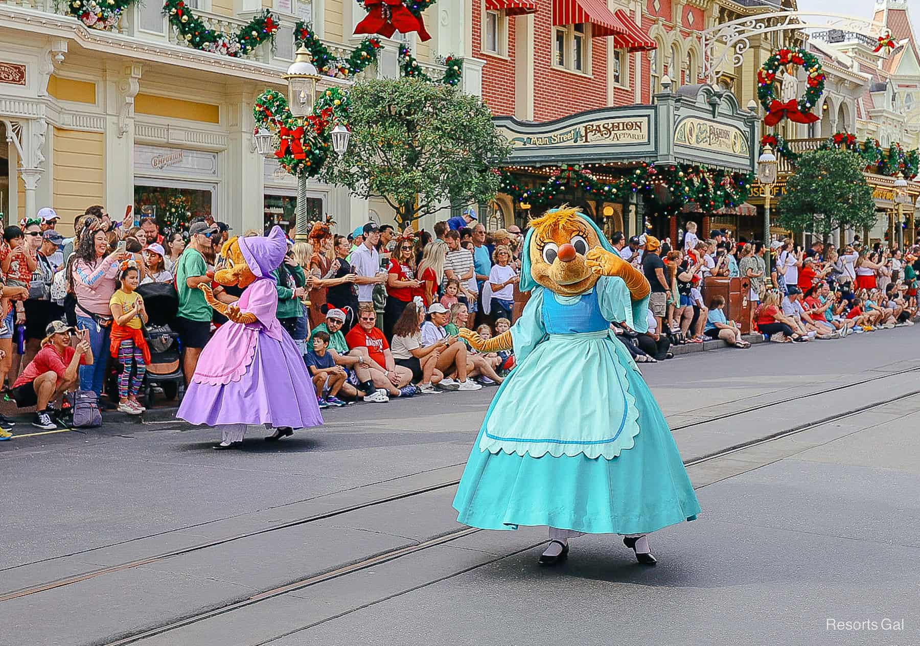 Suzy waves with Perla in the background. 