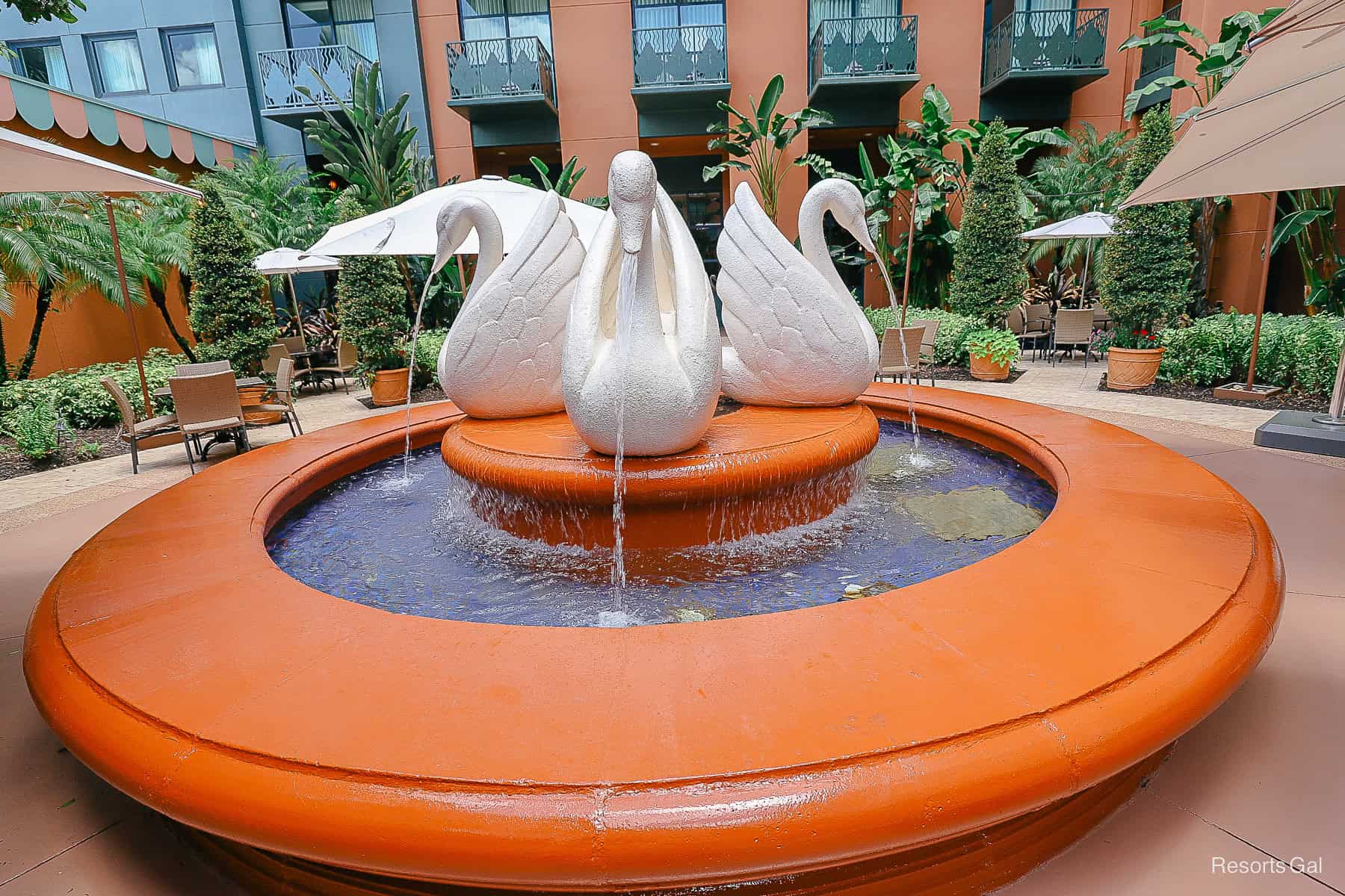 a fountain with Swans in the center of it at Disney's Swan and Dolphin 