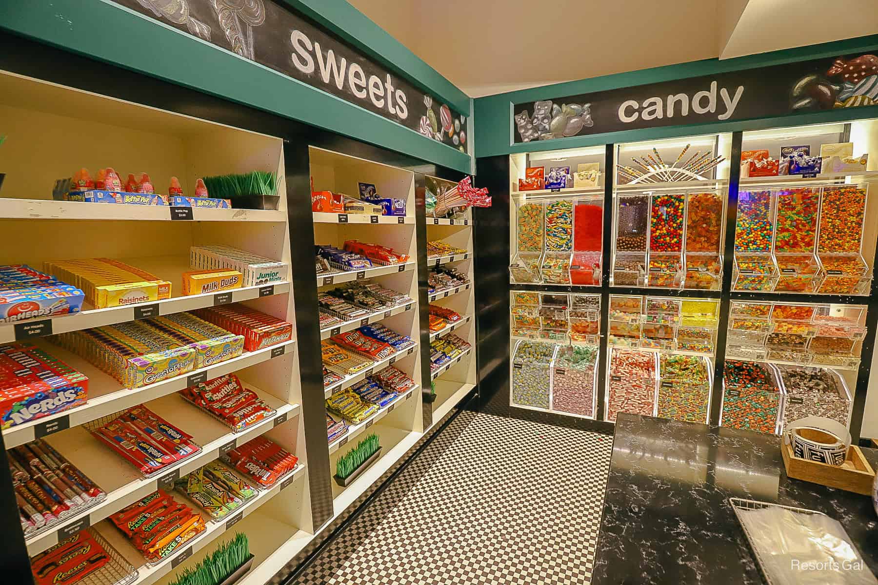 a display with snacks, candy, and other sweet treats 