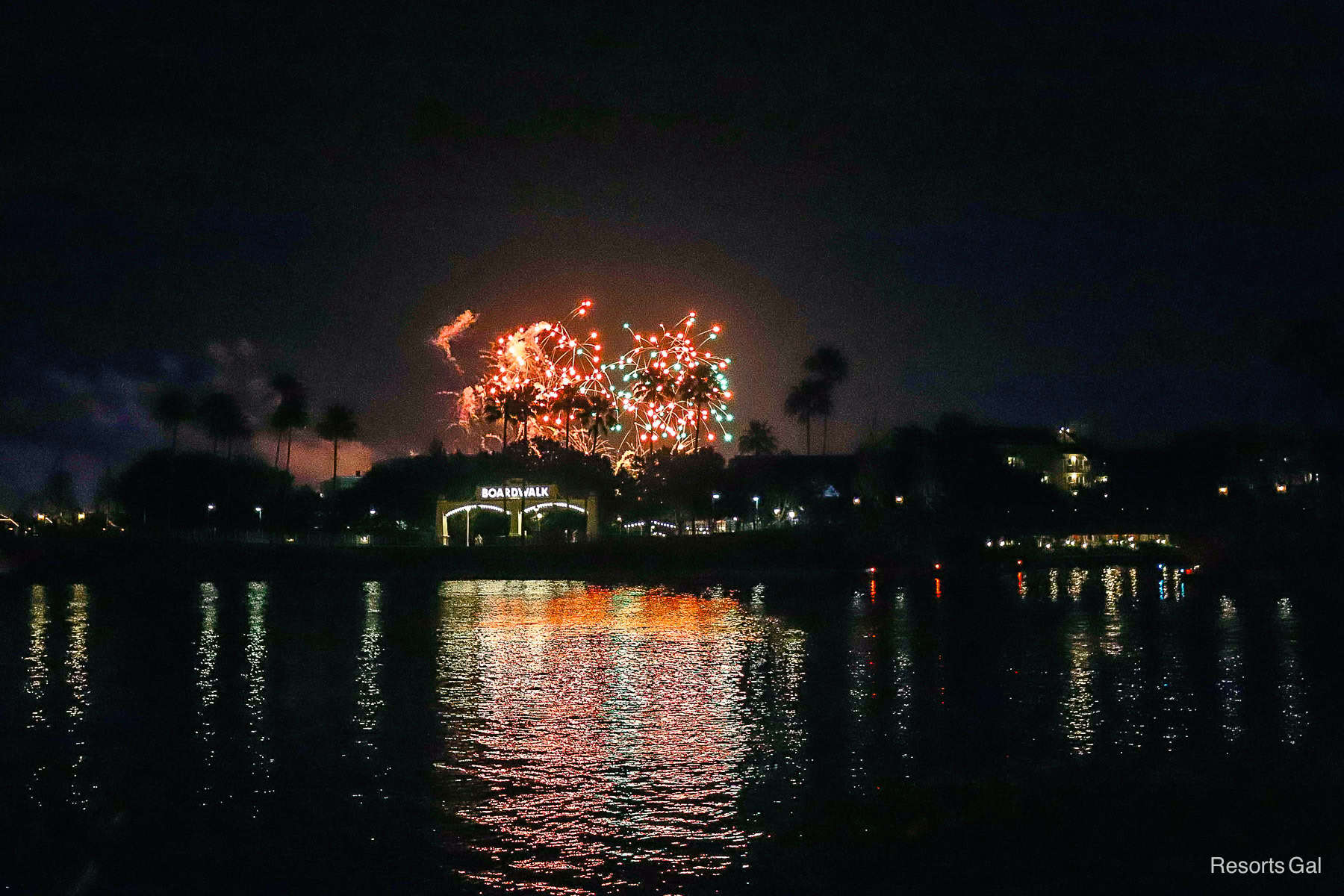 fireworks exploding over the Boardwalk sign as seen from Disney's Swan and Dolphin 