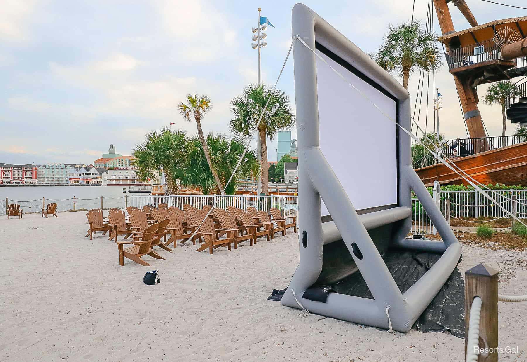 chairs and a blow up projection screen on a beach at Disney's Beach Club 