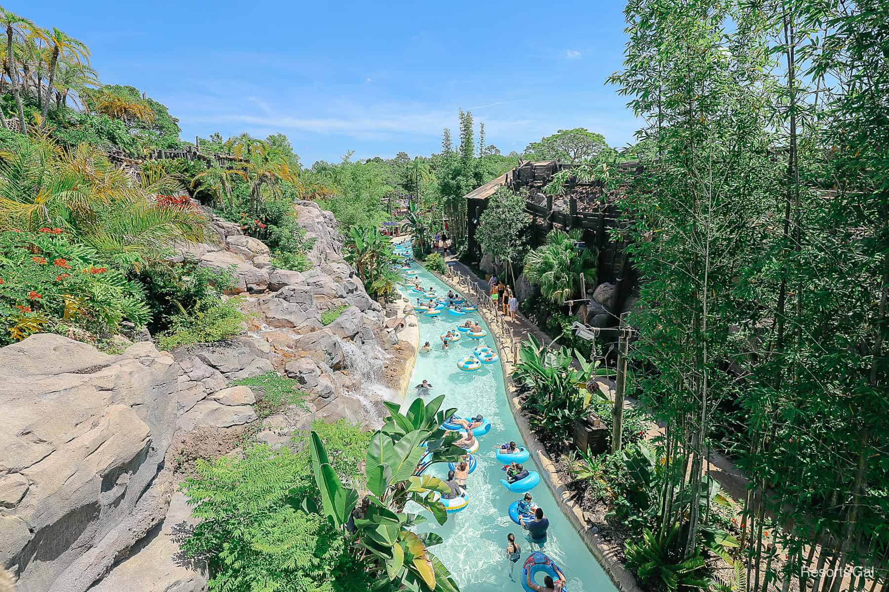 guests enjoying a lazy river at a Disney World water park 