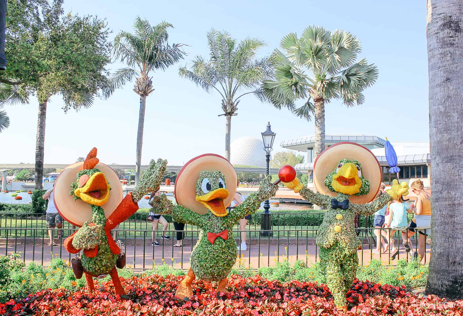 Panchito, Donald Duck, and Jose as the Three Caballeros in topiary form at Epcot 