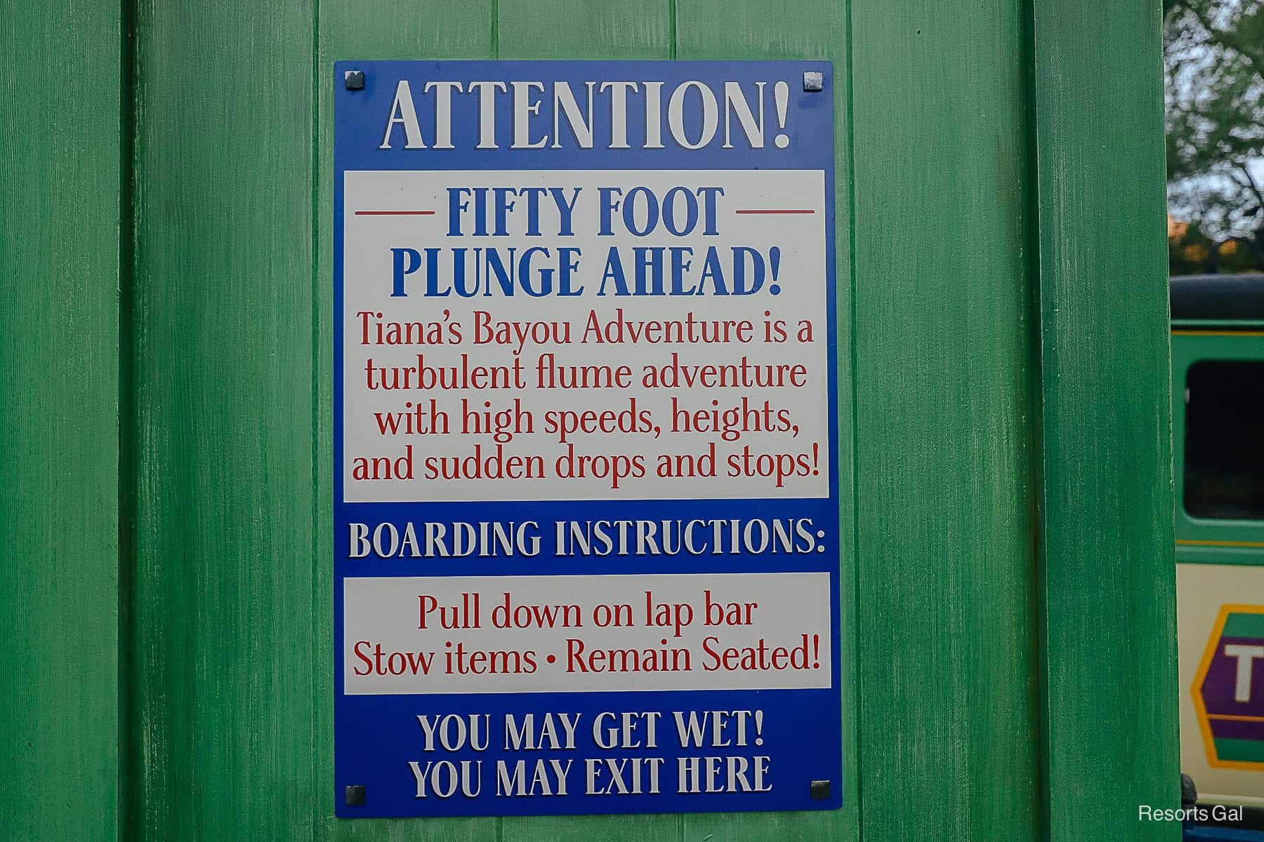 ride signs warning guests that Tiana's Bayou Adventure is a turbulent flume adventure with high speeds, heights, and sudden drops and stops. 