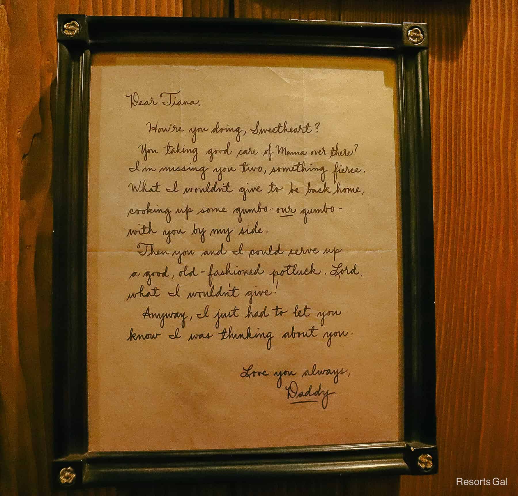 a letter framed from Tiana's father when he was in the war 