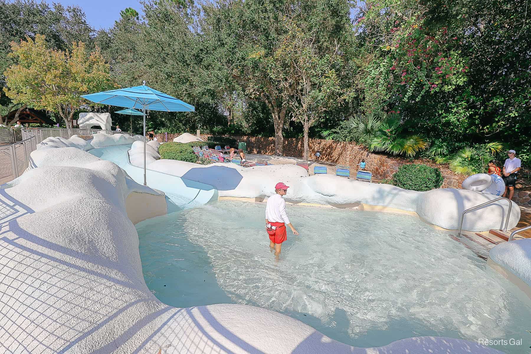 a lifeguard at the base of the inner tube ride at Tike's Peak 