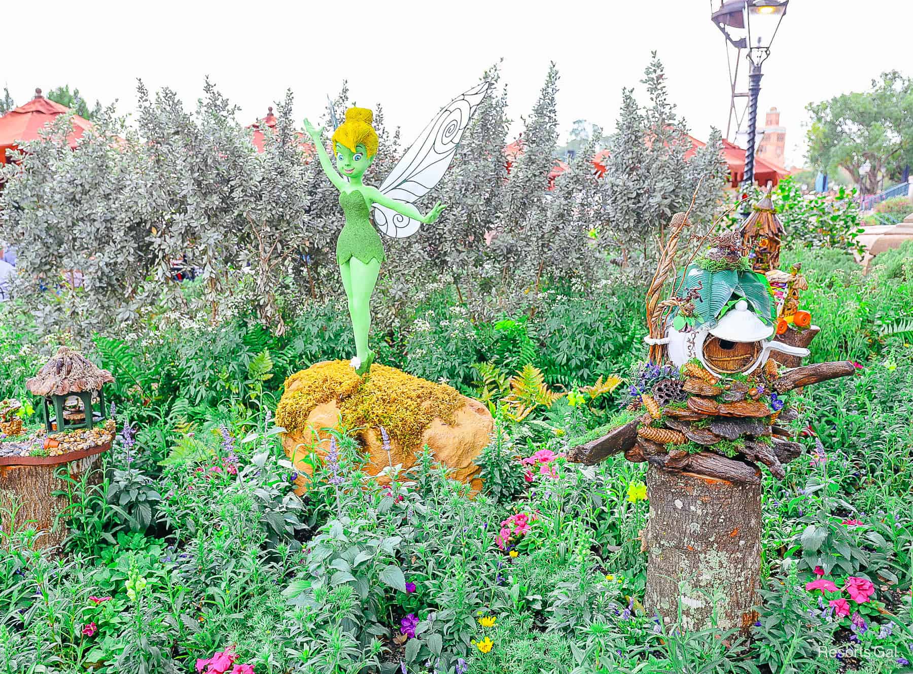 Tinker Bell and her fairy garden in topiary form at Epcot 