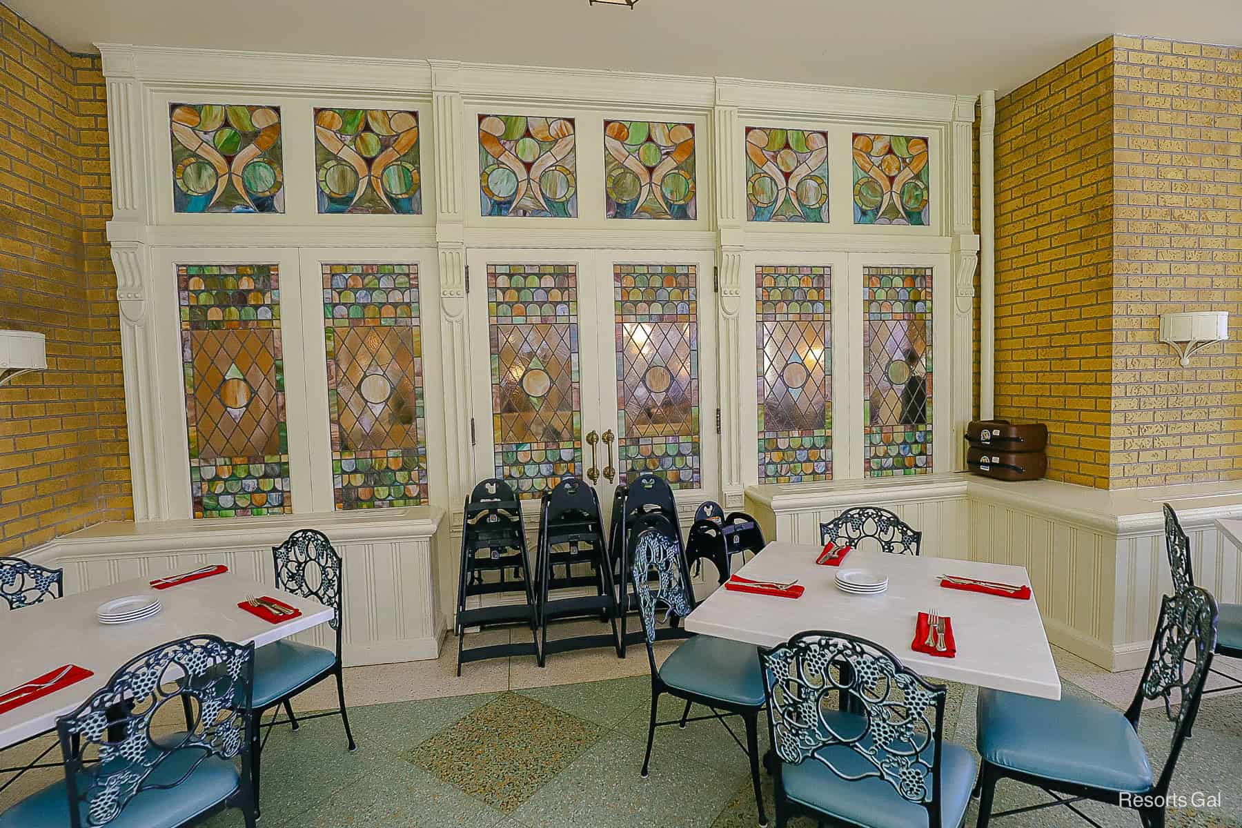 stained glass windows between the sunroom and main dining room 