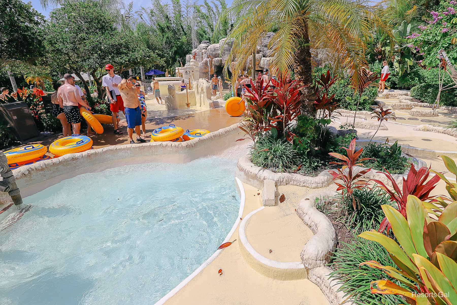 an alternative view of parents waiting for children at the end of the raft ride 