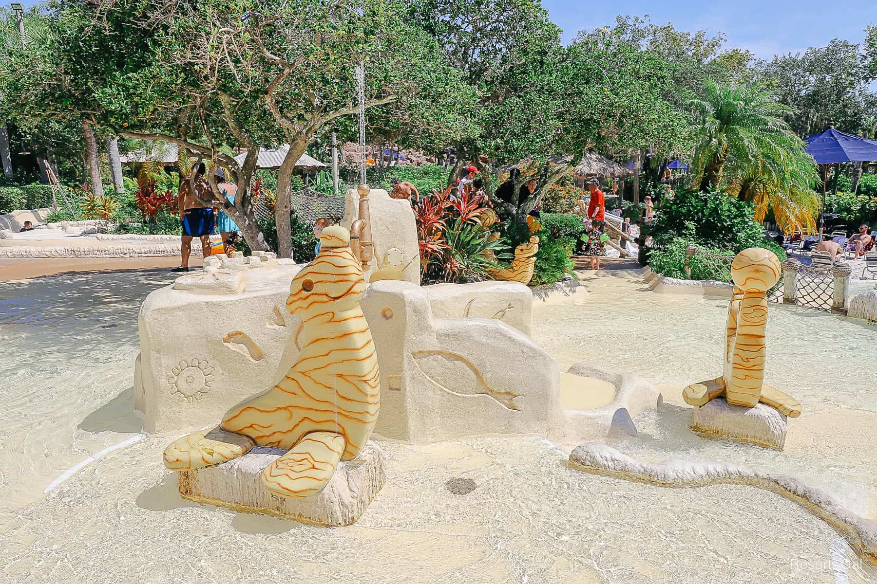 toy seals balancing balls on their noses in the children's water play area at Typhoon Lagoon 