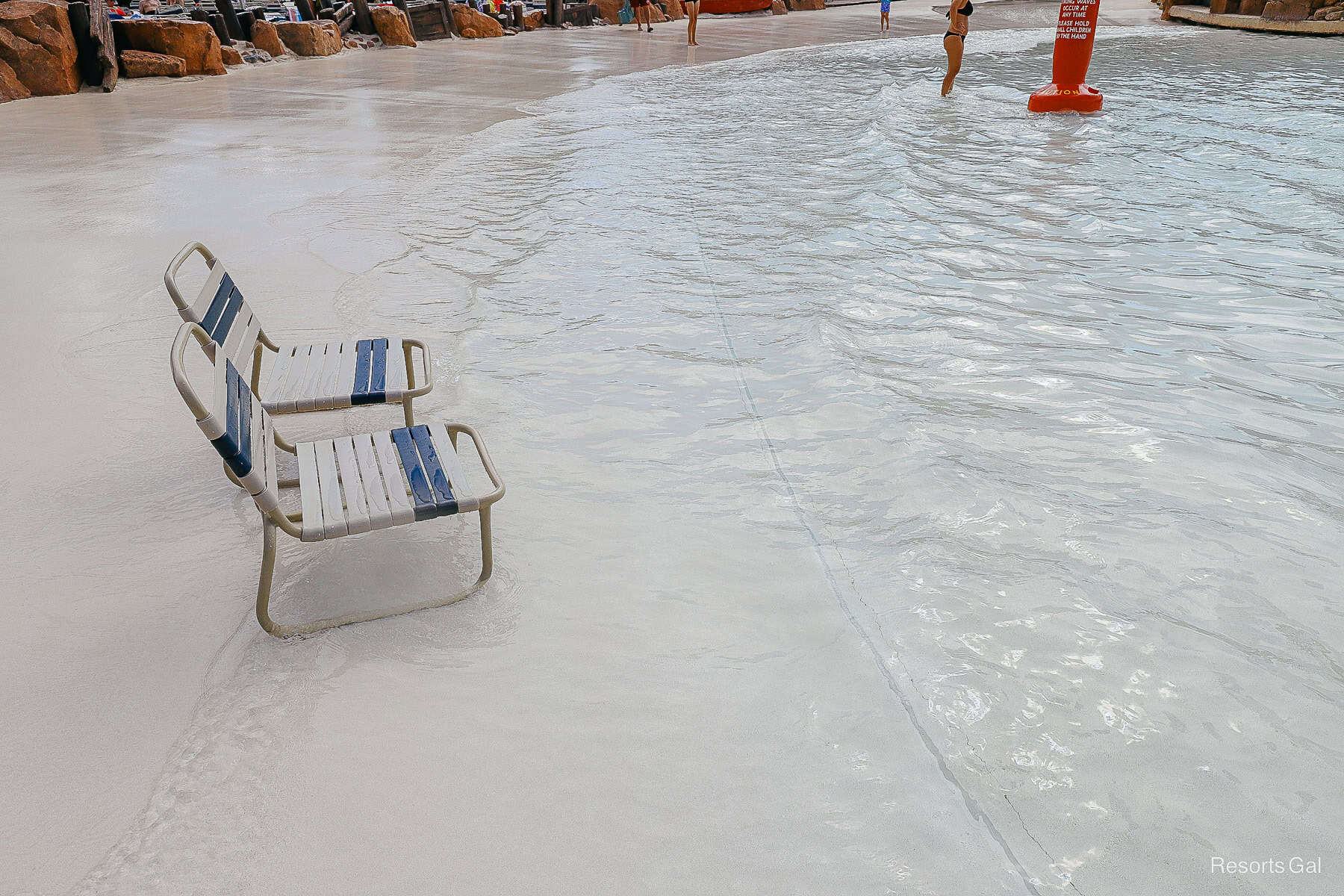 chairs where guests can sit in the back of the wave pool at Disney's Typhoon Lagoon 