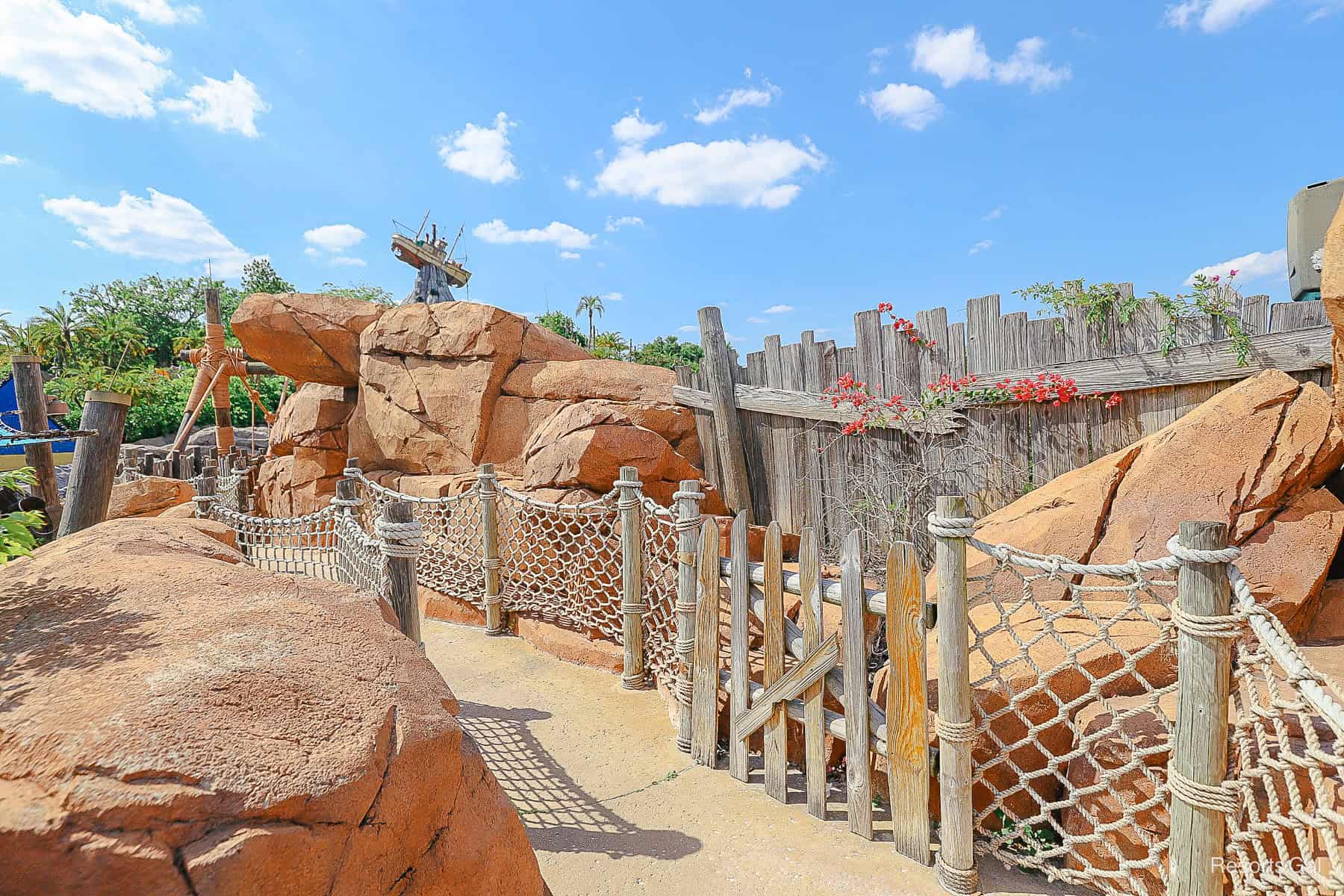 a path behind the wave pool with Typhoon Tilly in the distance 