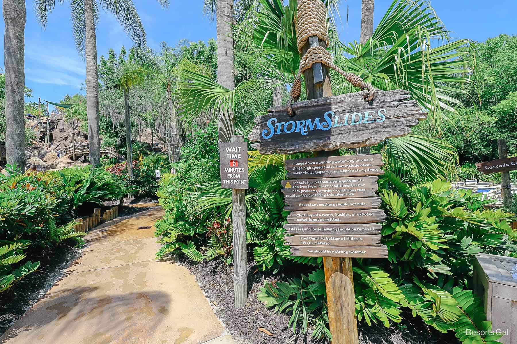 the signage for the Storm Slides with a wait times sign 