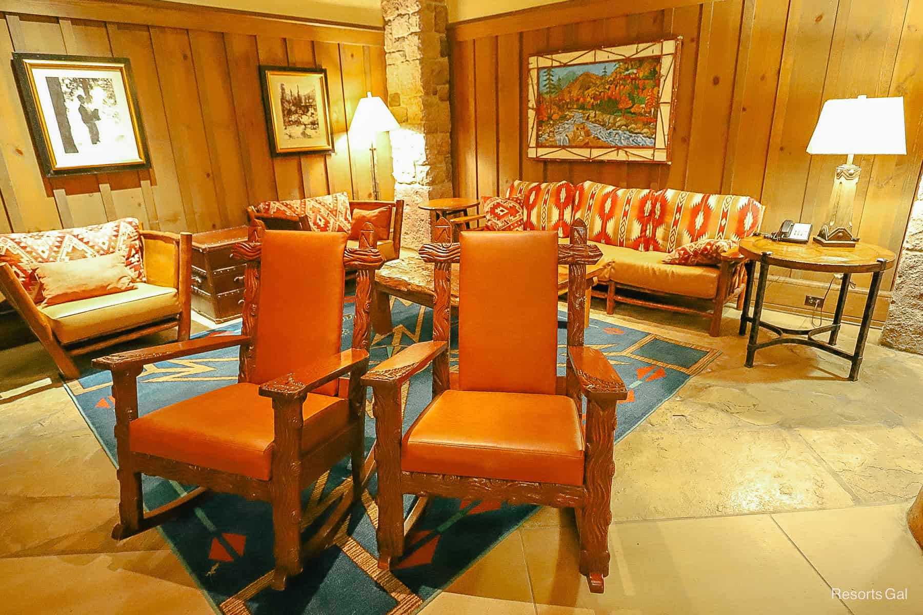 seating area with sofas and rockers in the Boulder Ridge Lobby Area 