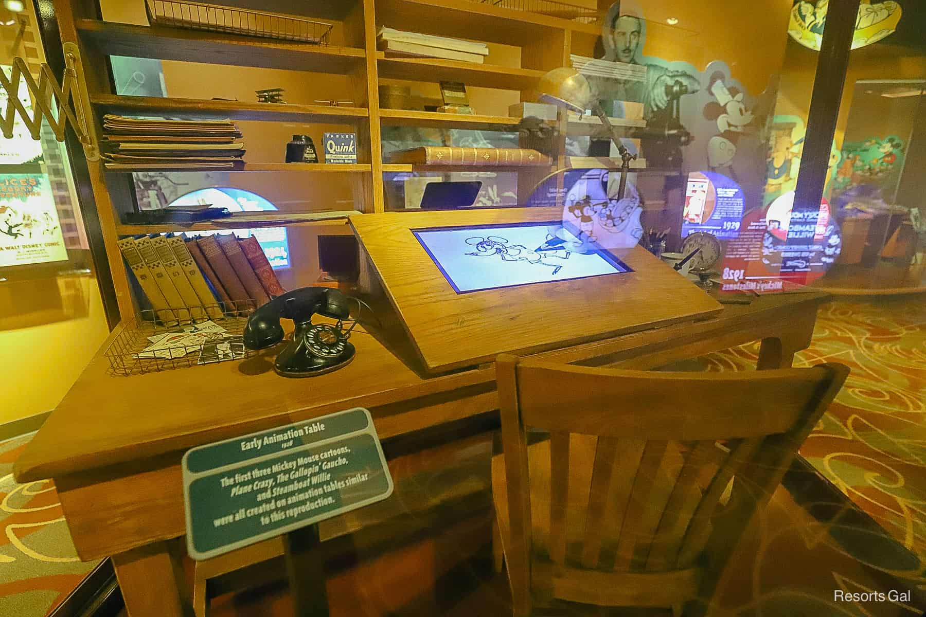an early animation table in a glass case inside Walt Disney Presents 