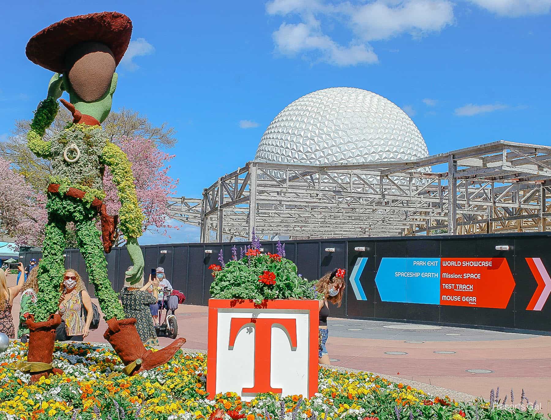 Woody tips his hat to construction at Epcot. 