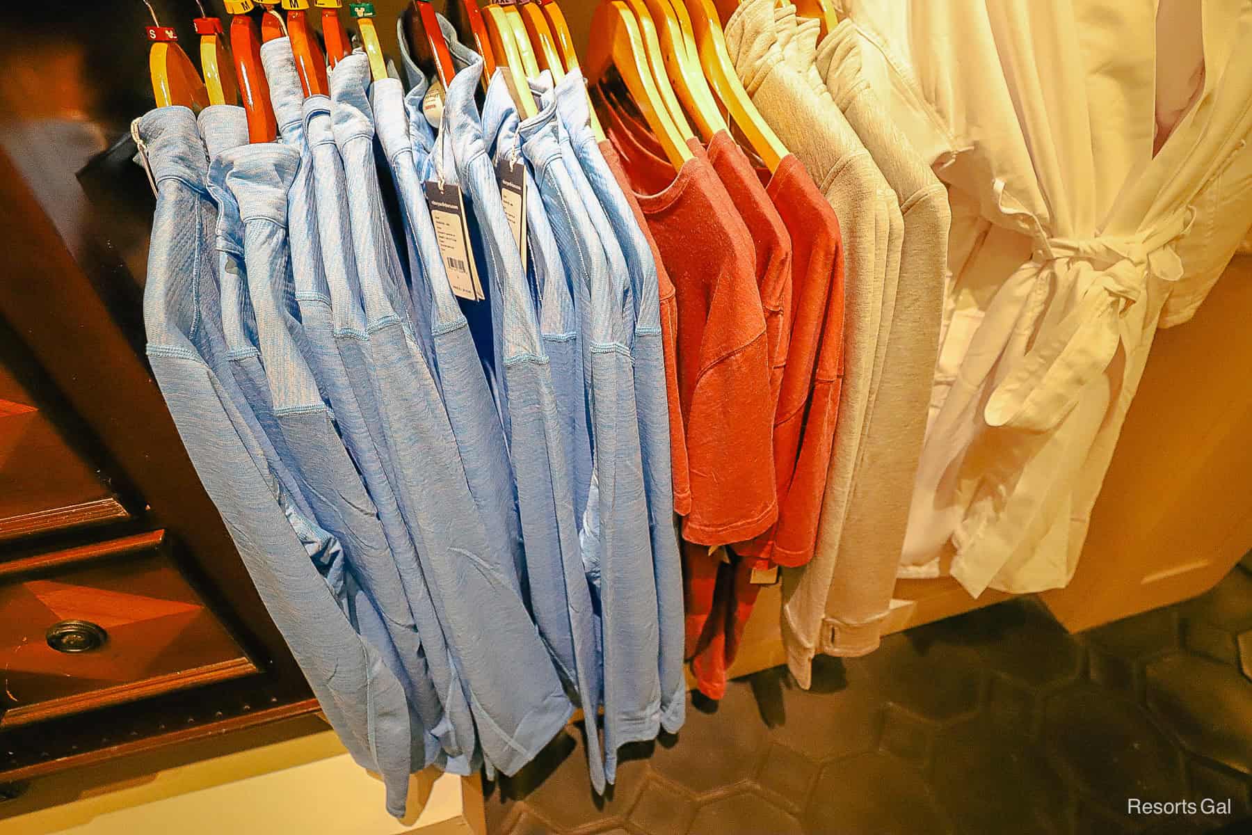 a rack of Yacht Club shirts 