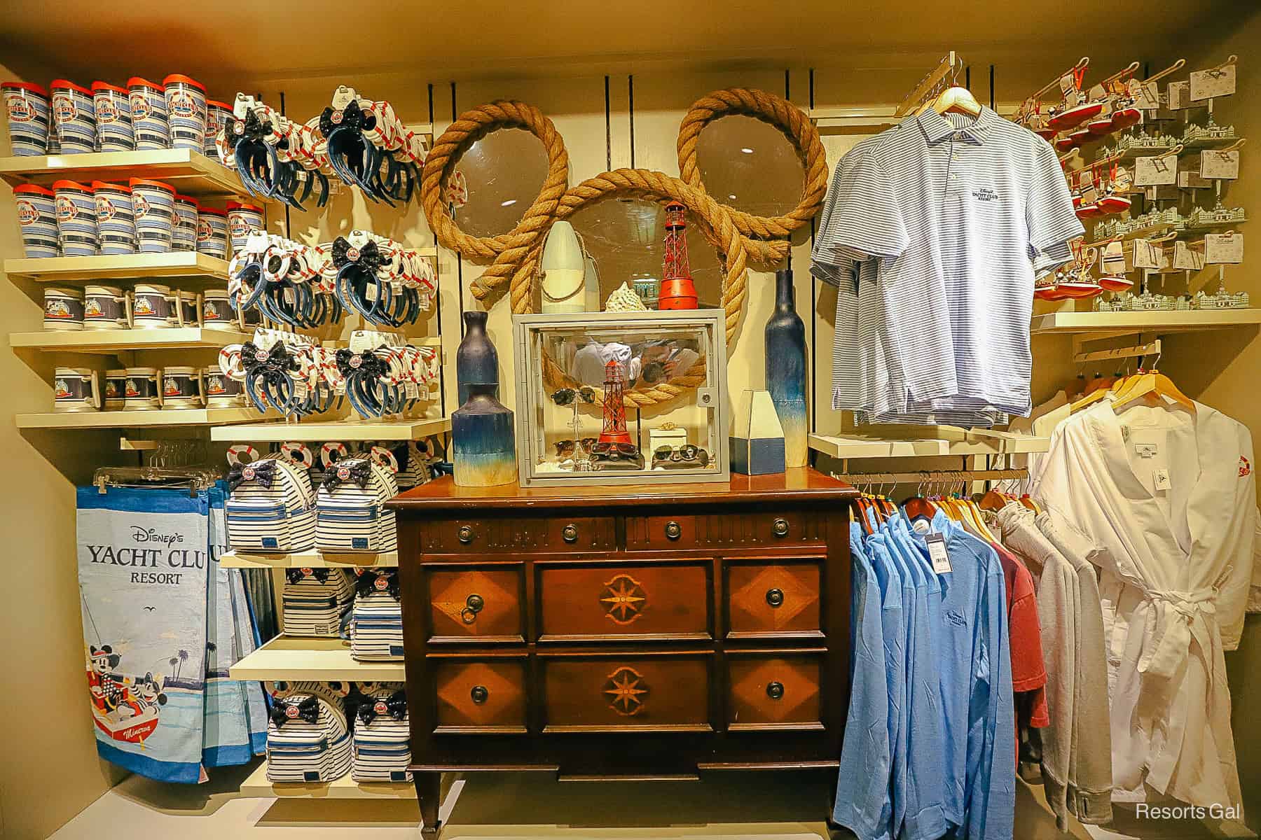 a display at the front of the gift shop with only Yacht Club Resort merchandise 